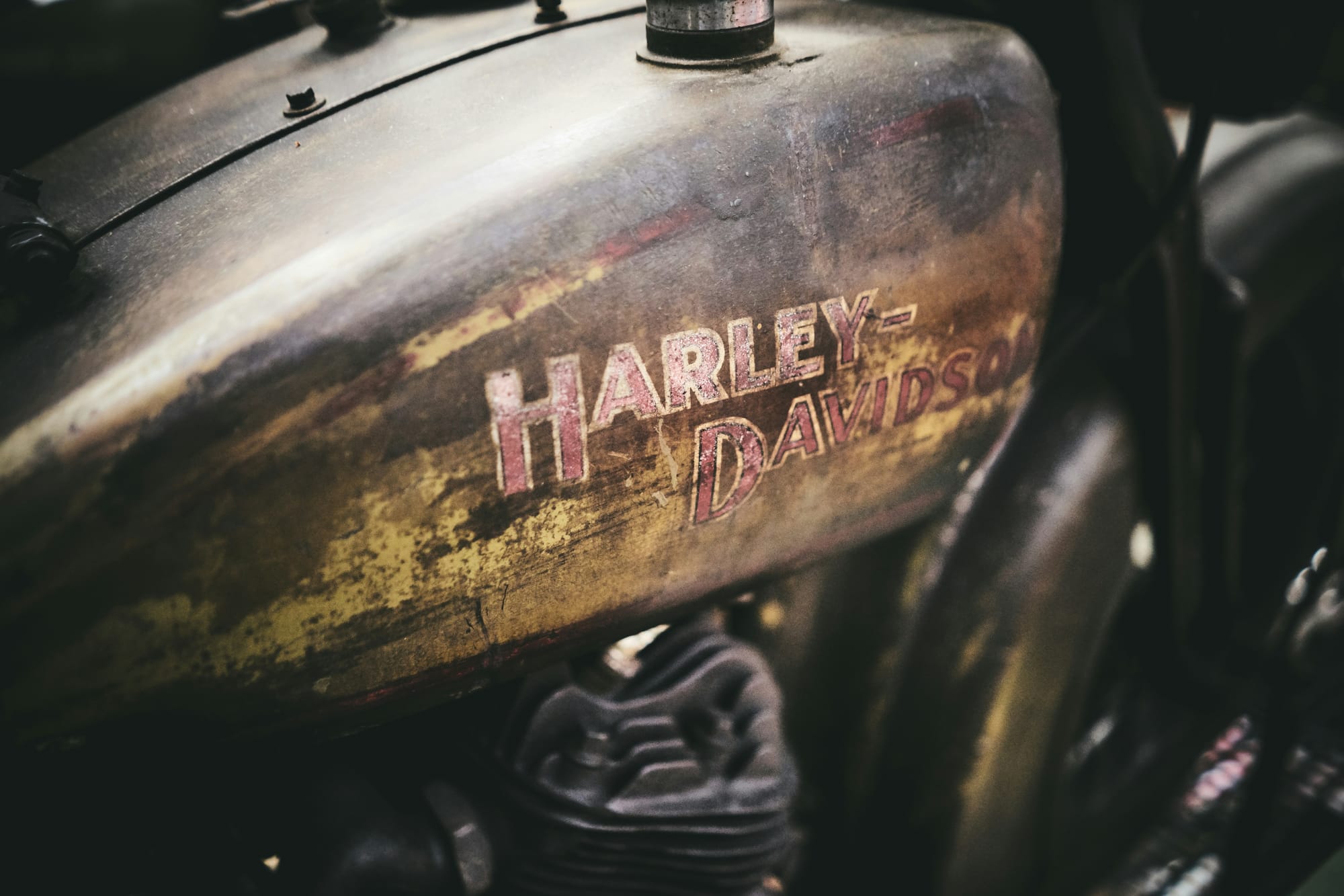 Close-up of a weathered patina Harley-Davidson fuel tank